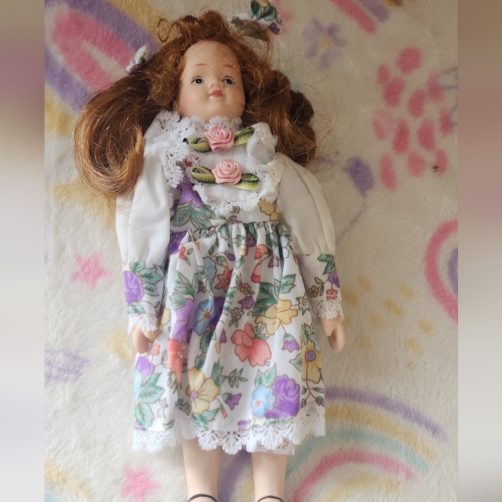 Vintage mini porcelain doll